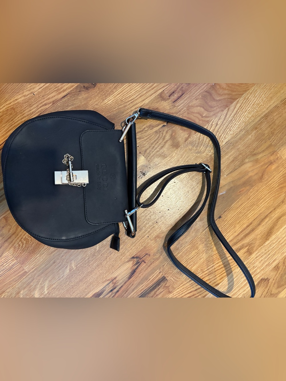 Black Crossbody Saddle Bag with Silver Lock